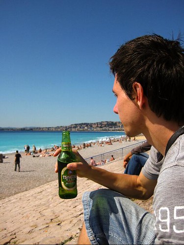 Marty drinking beer on the beach in Nice, France '08