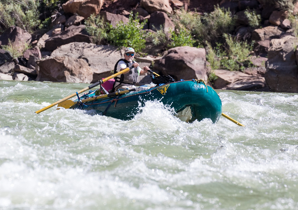 A park ranger whitewater rafting in the Green River of Utah's Desolation Canyon Area